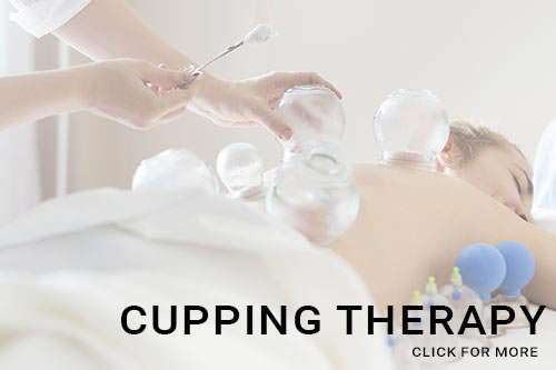 a woman getting cupping therapy